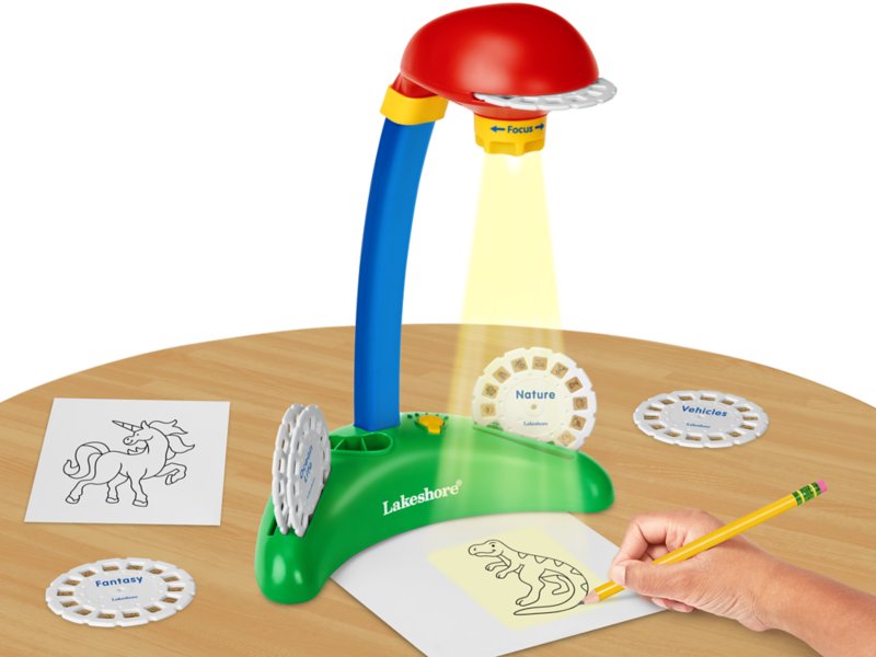 Trace 'N Draw Projector Set with 12 Discs. Animals, Vehicles, Clothing  (Project Runway). (2713)